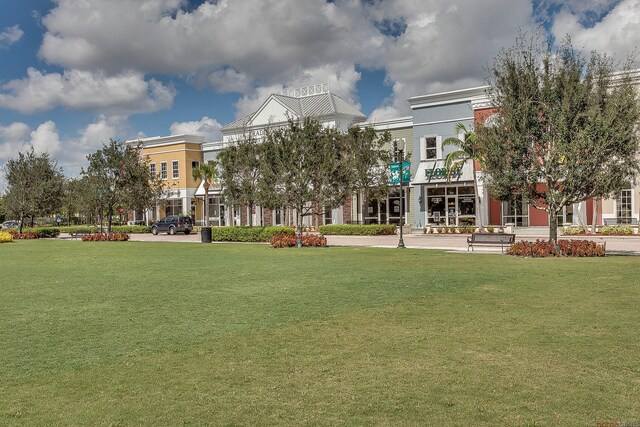 view of community featuring a yard