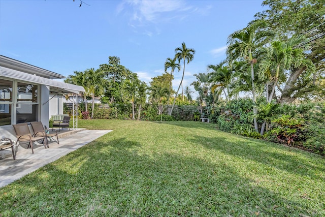 view of yard with a patio area