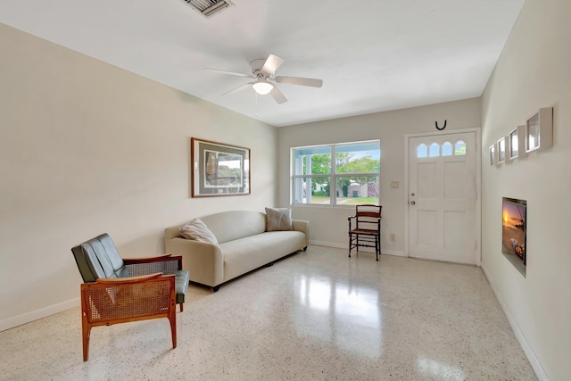 living room with ceiling fan