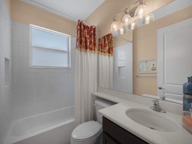 full bathroom featuring shower / bath combo with shower curtain, vanity, and toilet