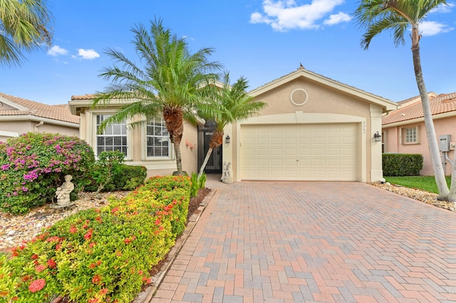 view of front of property featuring a garage