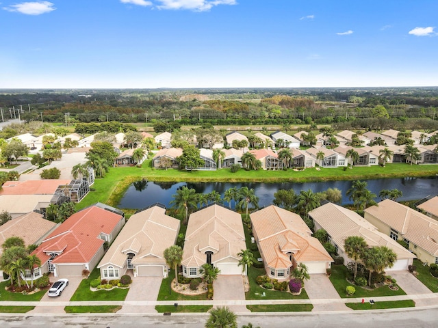 drone / aerial view featuring a water view