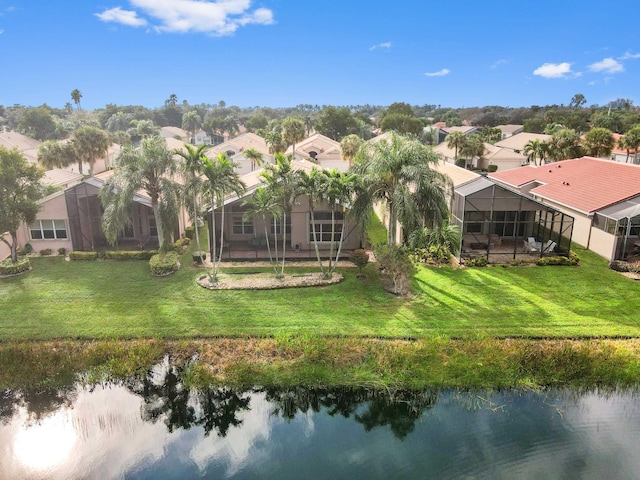 bird's eye view with a water view