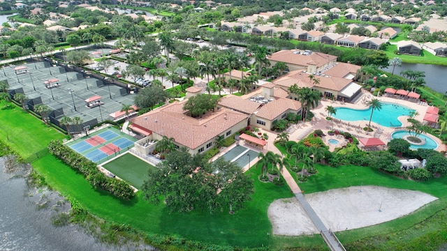 drone / aerial view with a water view