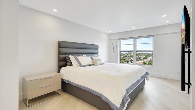 bedroom featuring light hardwood / wood-style flooring