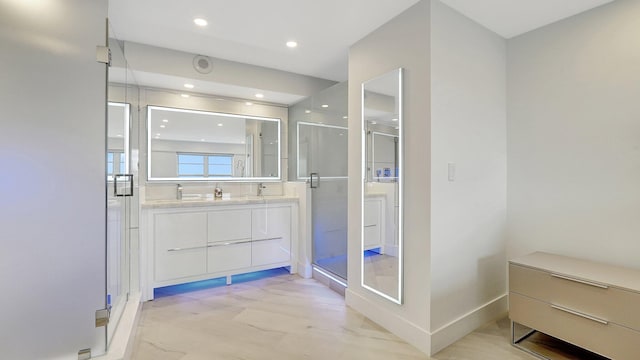 bathroom with vanity and an enclosed shower