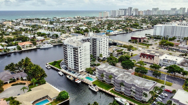 birds eye view of property featuring a water view