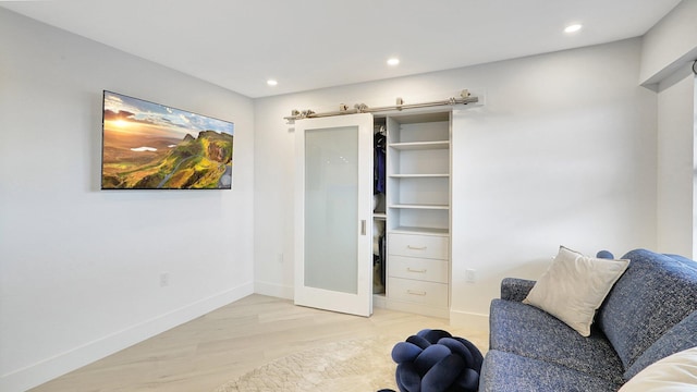 living area featuring light hardwood / wood-style flooring