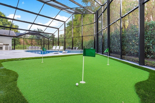 view of community featuring a pool with hot tub and a patio area