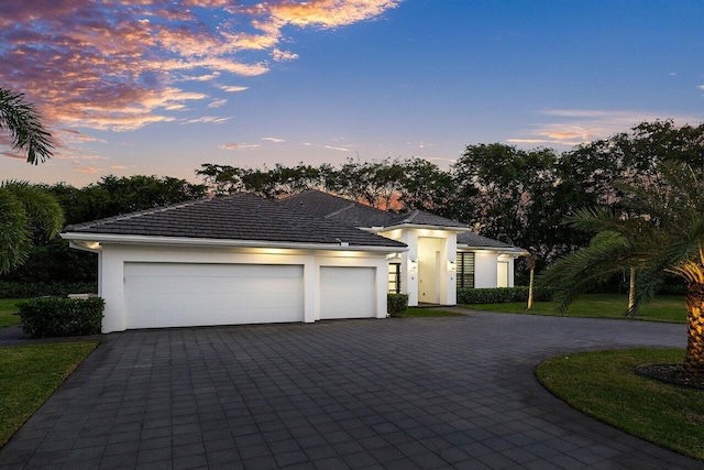 view of front of property featuring a garage