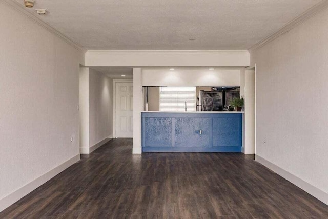 interior space with ornamental molding and dark wood-type flooring