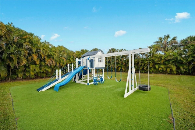 view of play area with a yard