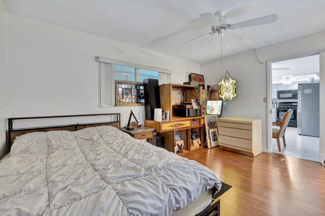 interior space featuring ceiling fan and hardwood / wood-style flooring