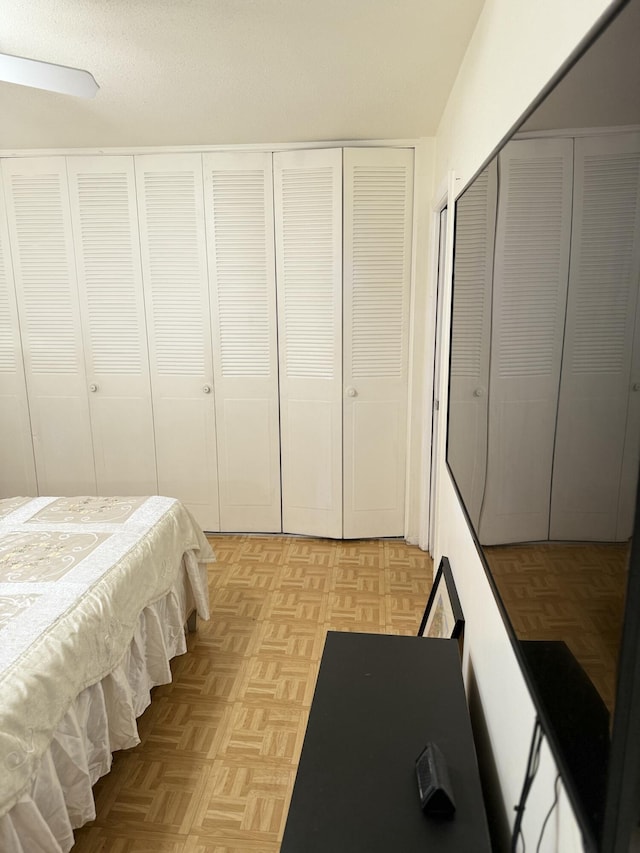 bedroom featuring light parquet floors