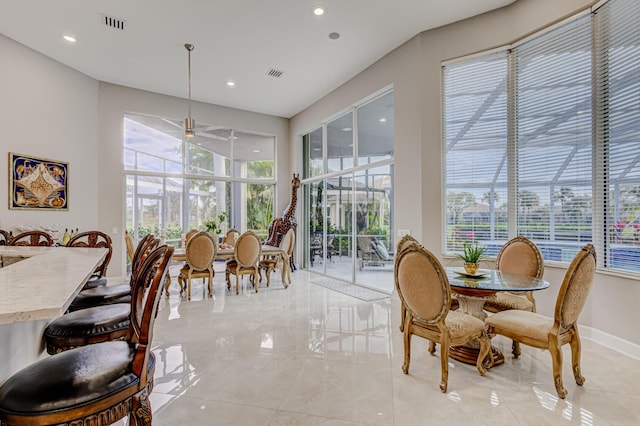 dining room with a healthy amount of sunlight