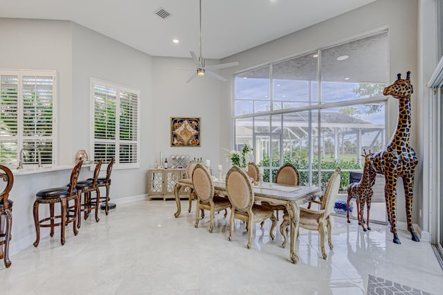 dining area featuring ceiling fan