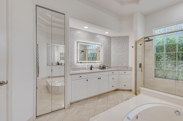 bathroom with vanity, separate shower and tub, and tile patterned flooring