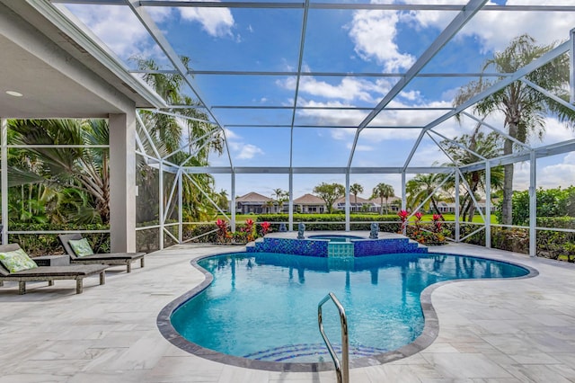 view of pool featuring a lanai, a patio, and an in ground hot tub