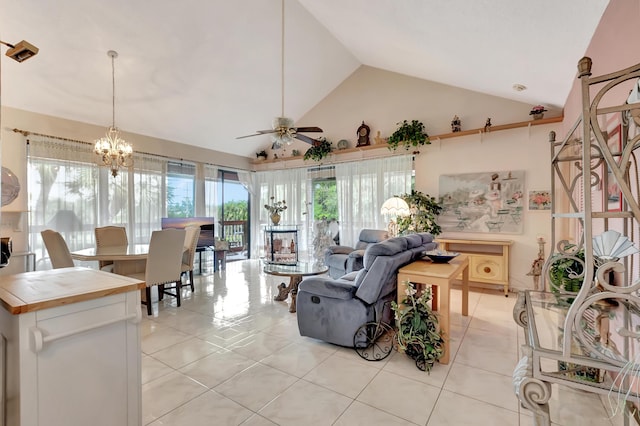 tiled living room with vaulted ceiling and ceiling fan with notable chandelier