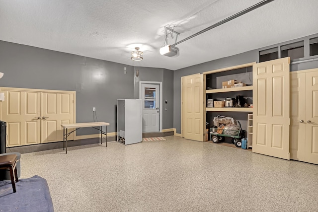 miscellaneous room with a textured ceiling