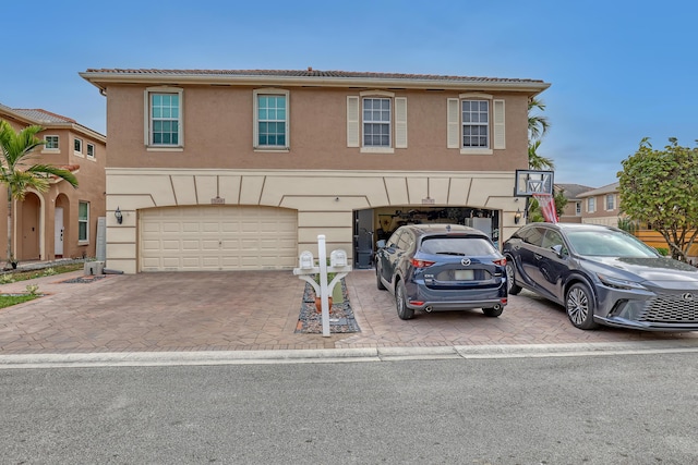 view of front of property featuring a garage