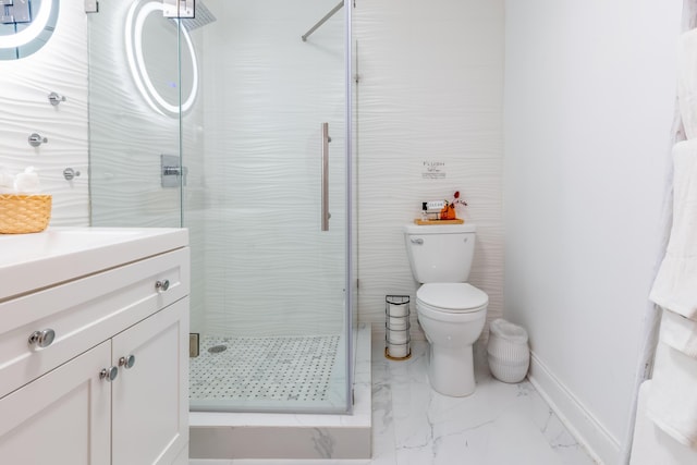 bathroom with vanity, toilet, and walk in shower