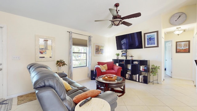 tiled living room with ceiling fan and lofted ceiling