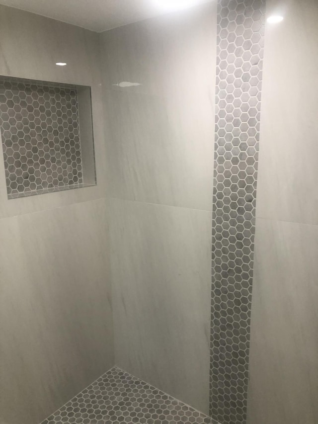 bathroom featuring walk in shower