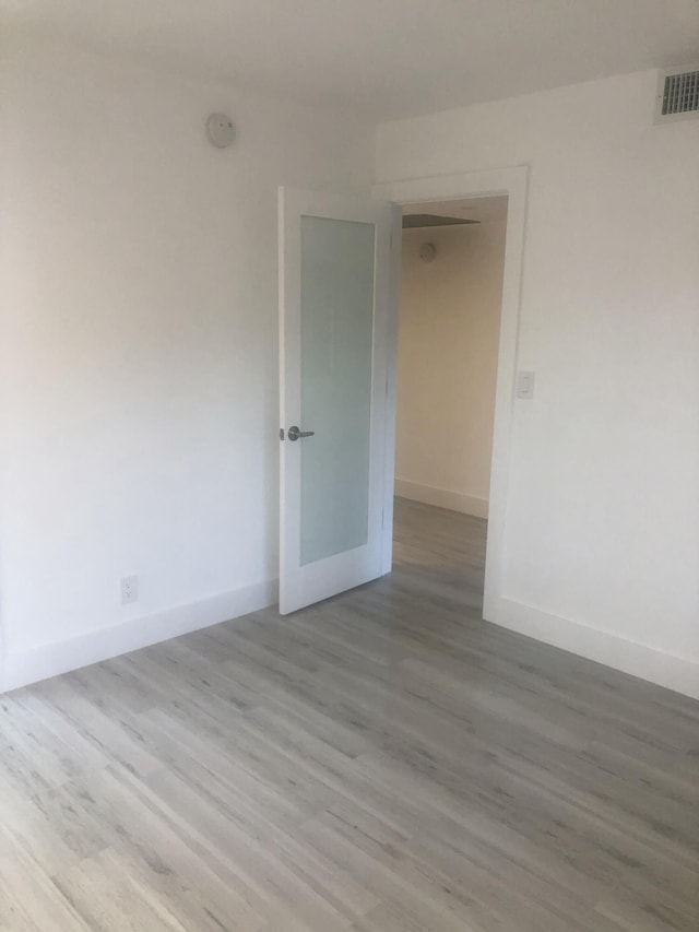 empty room featuring light hardwood / wood-style floors