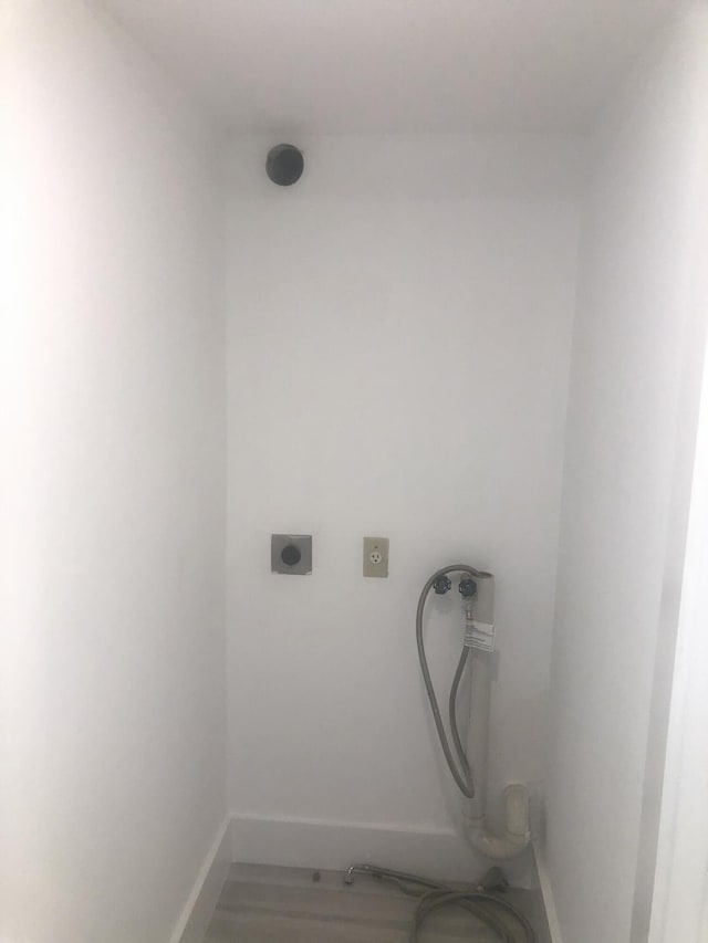 washroom featuring hookup for an electric dryer