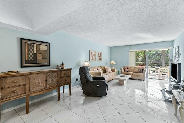 tiled living room with a textured ceiling