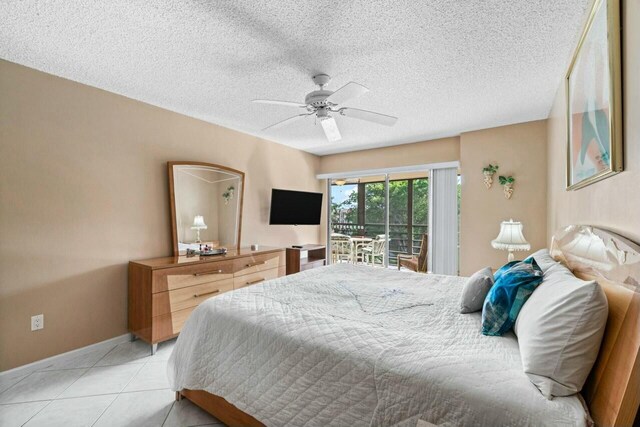 tiled bedroom featuring a textured ceiling, access to outside, and ceiling fan