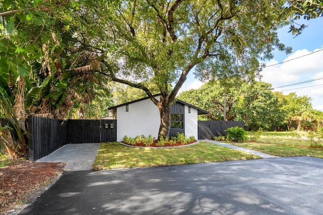 view of property exterior featuring a yard