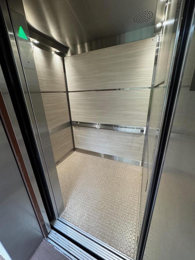 bathroom featuring elevator