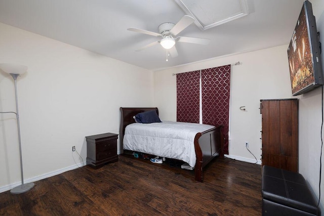 bedroom with ceiling fan and dark hardwood / wood-style flooring