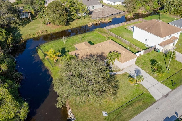 drone / aerial view with a water view