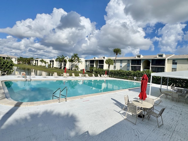 view of pool featuring a patio