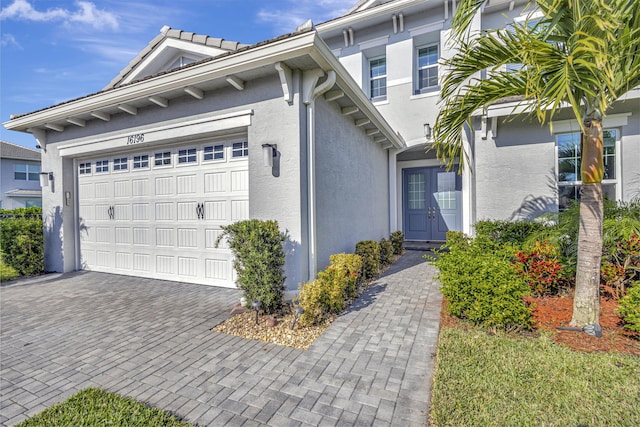 view of front of home with a garage