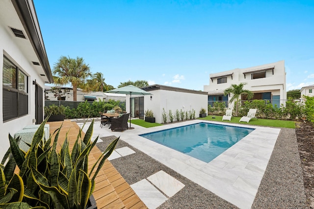 view of swimming pool featuring a patio