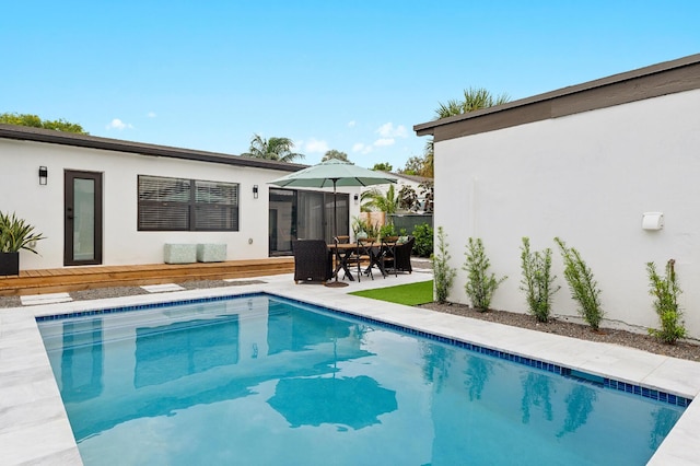 view of pool with a deck