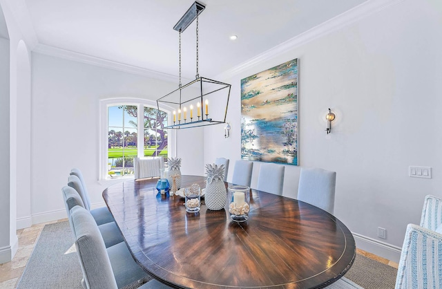 dining space featuring ornamental molding