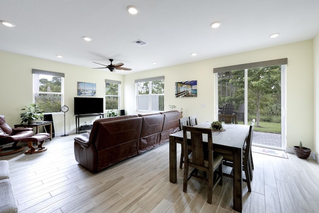 dining area featuring plenty of natural light and ceiling fan