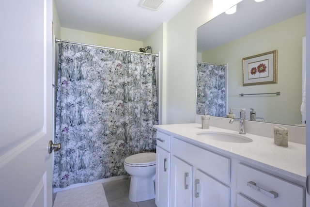 bathroom featuring tile patterned flooring, vanity, toilet, and a shower with shower curtain