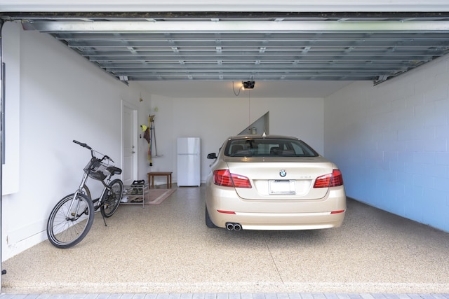 garage featuring white refrigerator