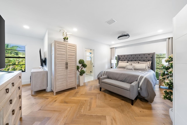 bedroom featuring light parquet flooring