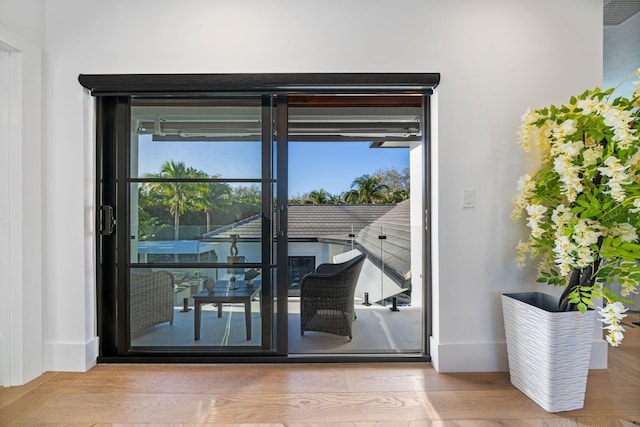 doorway to outside featuring hardwood / wood-style floors