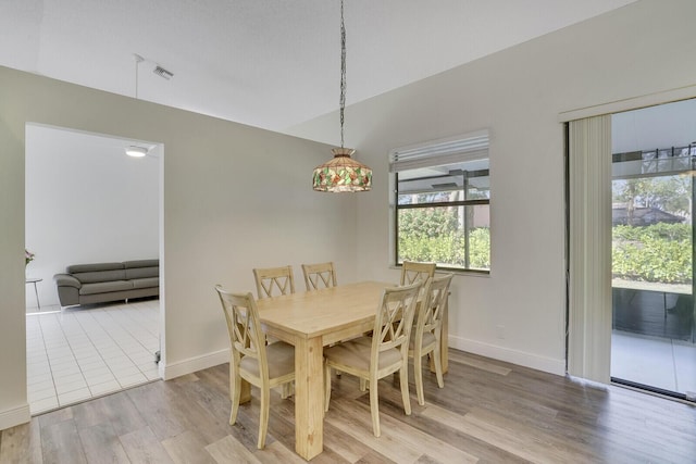 dining room featuring light wood-type flooring