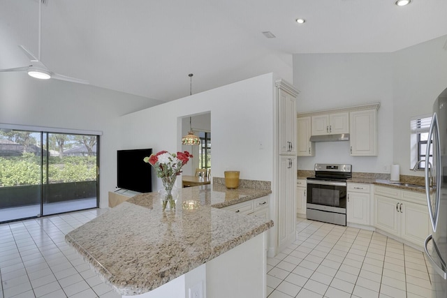 kitchen with kitchen peninsula, stainless steel appliances, high vaulted ceiling, and light stone counters