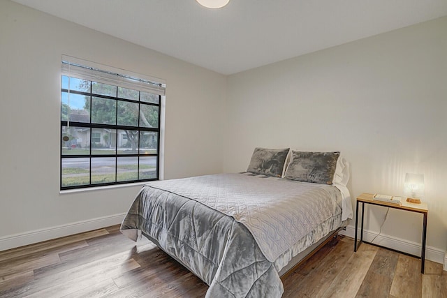 bedroom featuring hardwood / wood-style floors