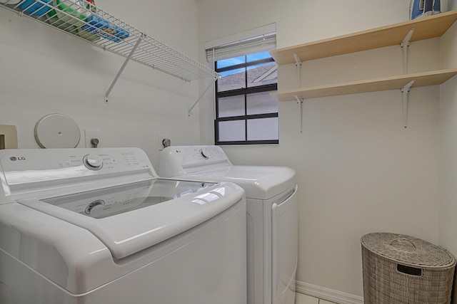 laundry area featuring washer and clothes dryer